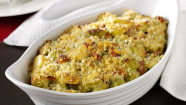 Gratin of Brussels sprouts with lardons, cream and almonds